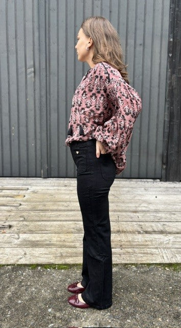 Bukse sort med gullknapper