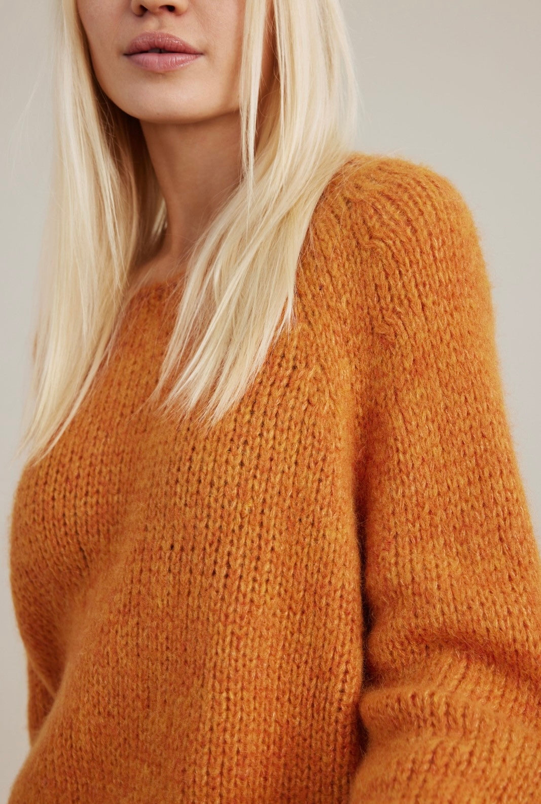 Reva  genser light orange